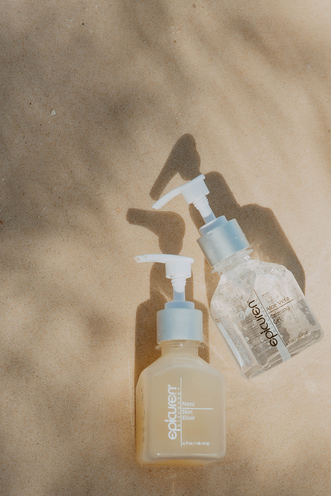 shot of two products laying on the beach