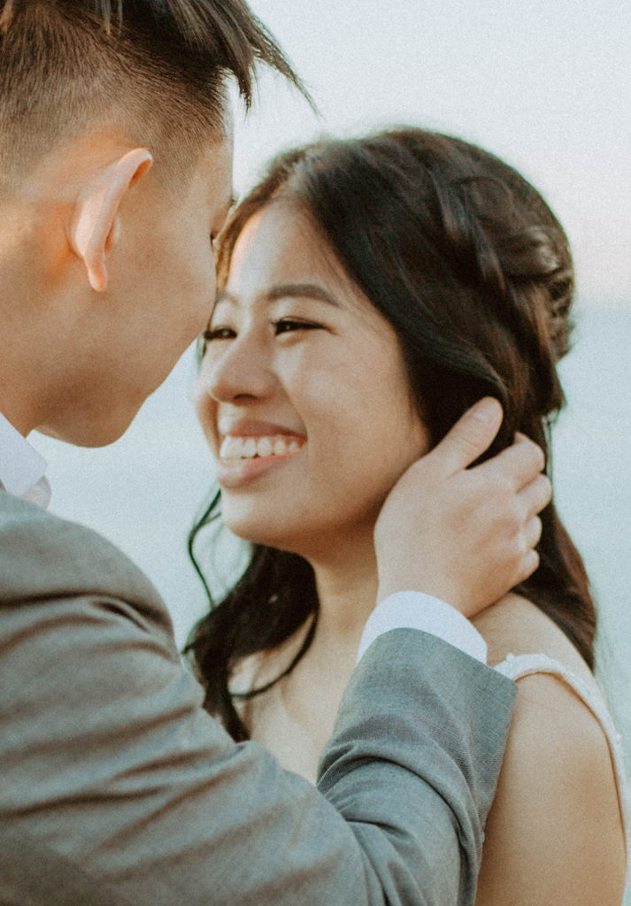 close up of the couple smiling at each other