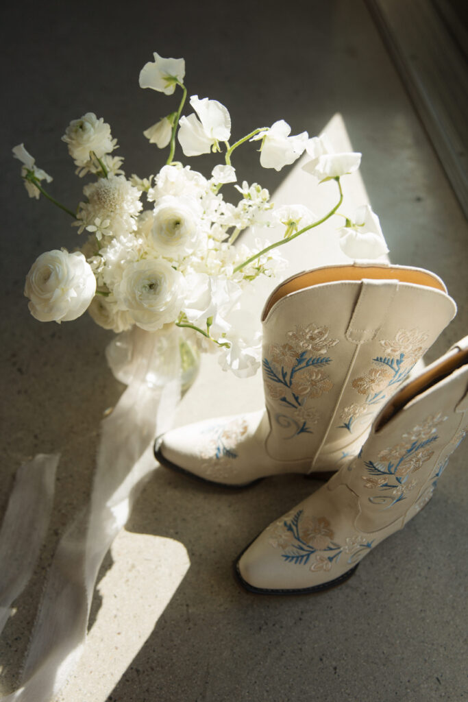 country neutral wedding details of cowgirl bride boots