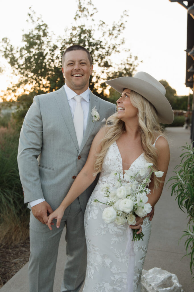 Bride and Groom Hand in hand at Knoxville wedding venue