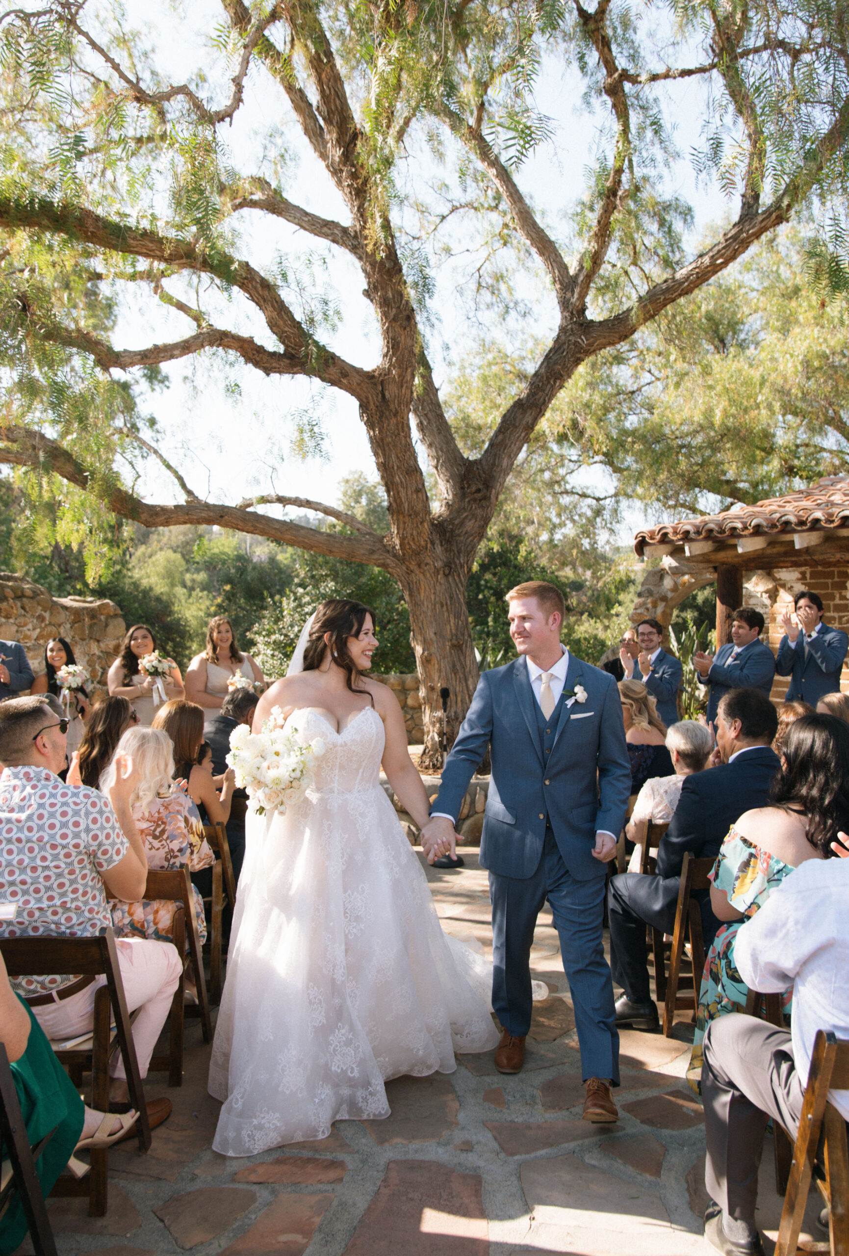 Bride and Groom Walking down aisle after ceremony