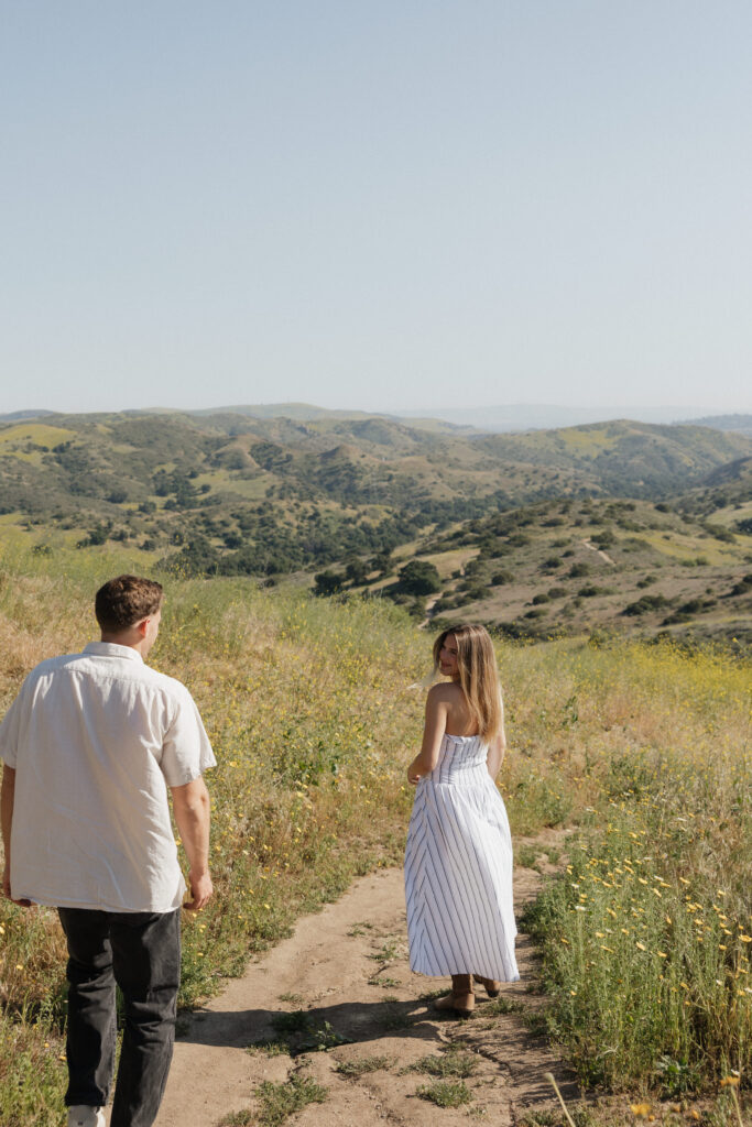 Engagement Photos of couple walking side by side together