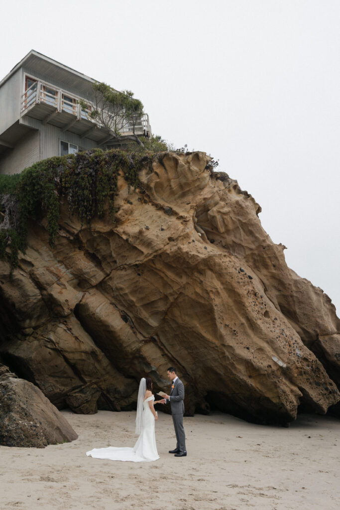 Bride and groom reading vows